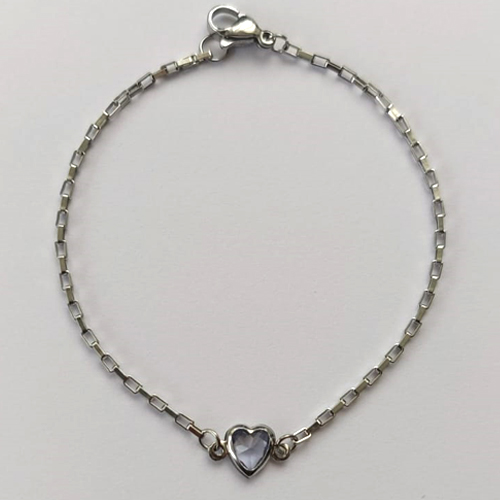 PULSEIRA EM AÇO INOXIDÁVEL - (ACO1012) PULSEIRA TIJOLINHO COM PINGENTE CORAÇÃO EM ZIRCÔNIA LILÁS 7MM - TAMANHO 18CM - FECHO LAGOSTA - COMPOSIÇÃO: AÇO INOXIDÁVEL (AÇO1465) ACPS000610