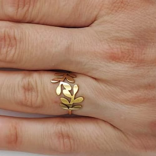 ANEL EM AÇO INOXIDÁVEL 316L ANEL DOURADO COM FOLHAS LARGURA 1.2MM (VALOR UNITÁRIO) ACAN000042