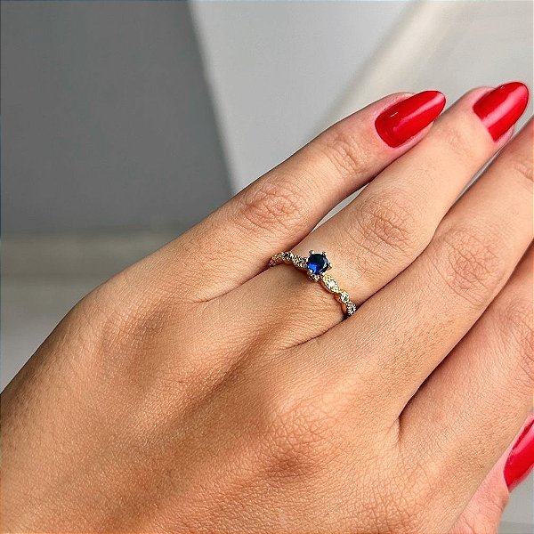 Anel Aparador Navetes e Zircônia Azul Folheado a ouro 18K