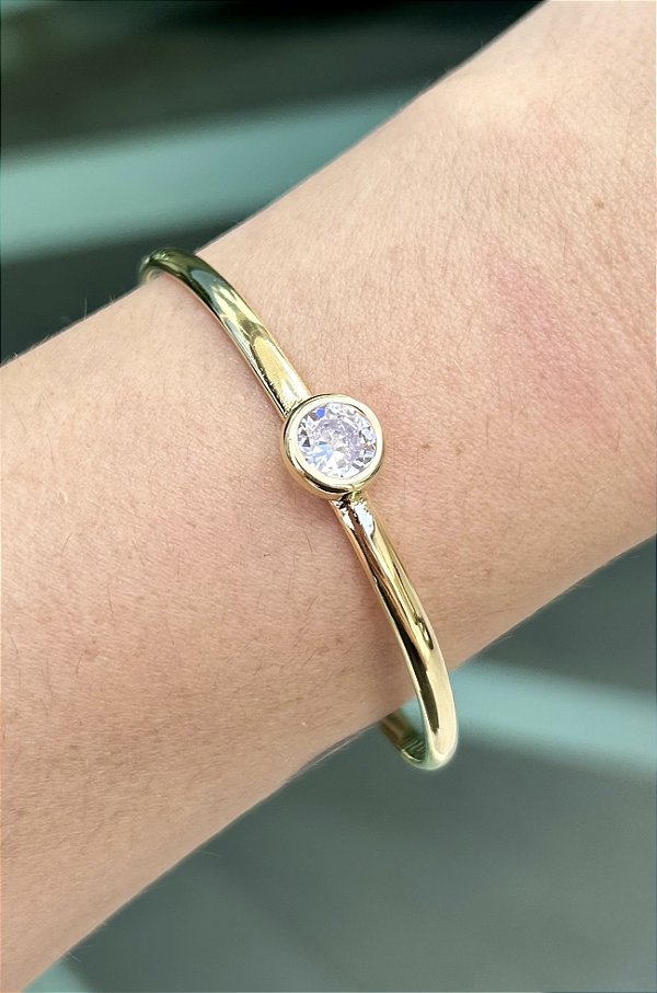 Bracelete com zircônia central e banho de ouro 18k