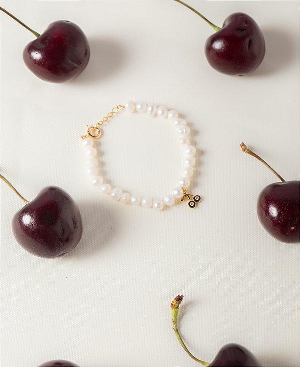 Pulseira pérola cereja com feicho