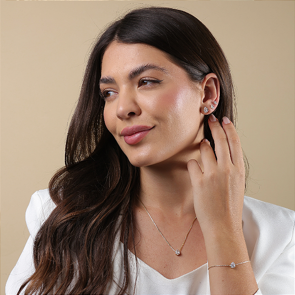 BRINCO PONTO DE LUZ FORMATO GOTA COM PEDRA DE ZIRCÔNIA - BANHO EM OURO 18K