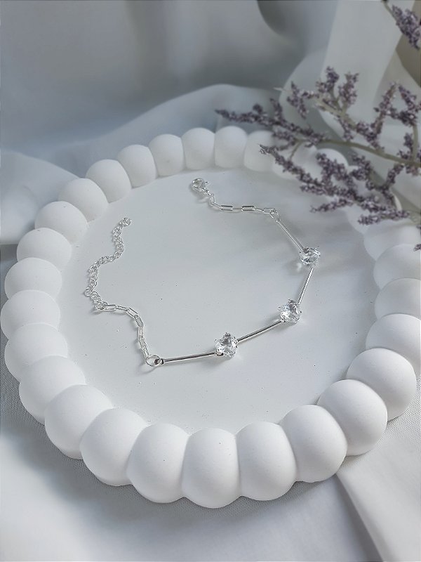 Pulseira três corações