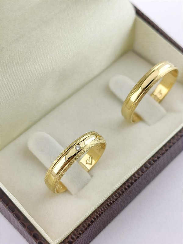 ALIANÇA COM PEDRA EM OURO 18K