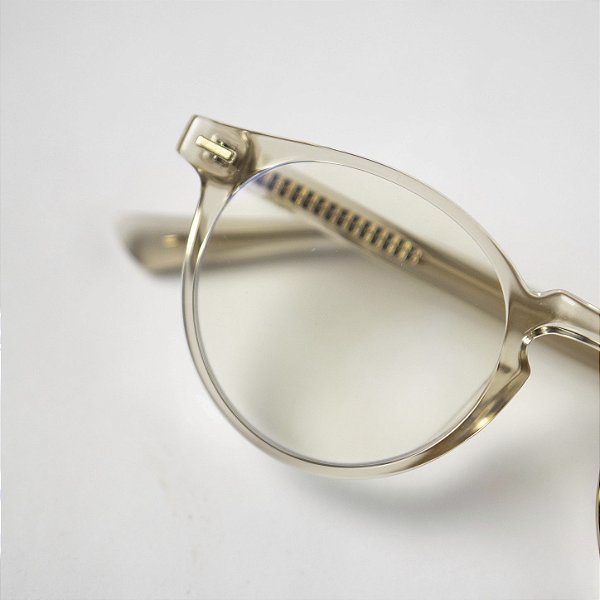 Óculos redondo transparente dourado