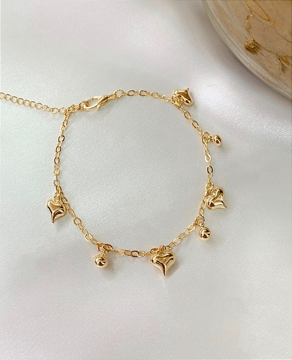 Tornozeleira corações dourada