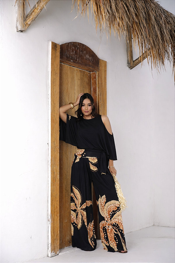 Calça pantalona estampada em malha fria com pala na cintura