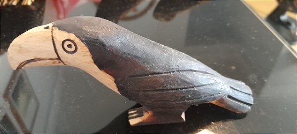 Esculturas em Madeira Guarani: A Alma da Floresta em sua Casa ´Tucano