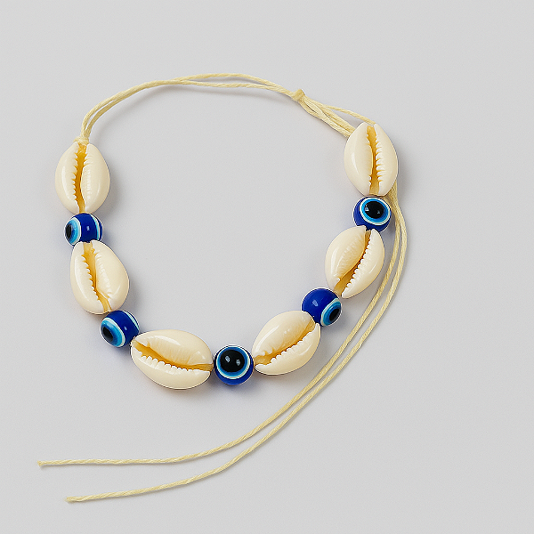 Pulseira búzios/ olho grego