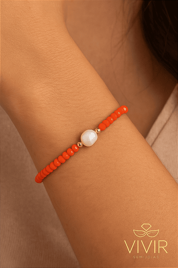 PULSEIRA DE CRISTAL CORAL VIBRANTE COM PÉROLA