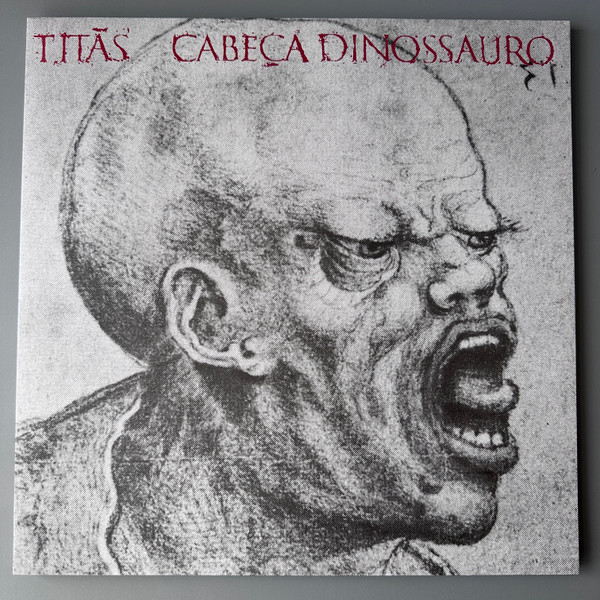 Titãs - Cabeça Dinossauro