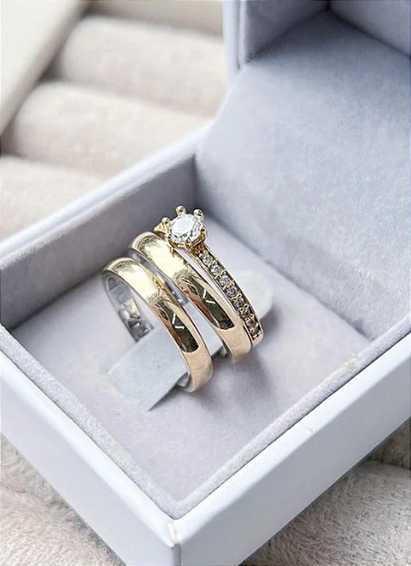 Aliança redonda 4mm moeda antiga com forro de prata com solitário luxuoso