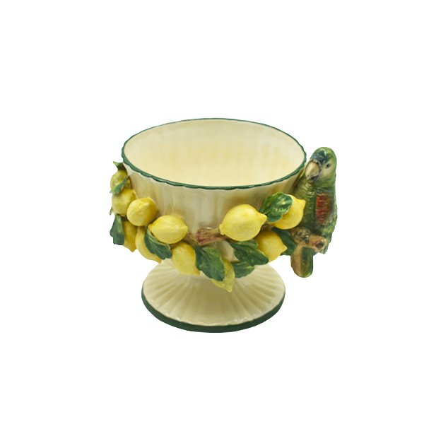 Taça palmeiras com limões e pássaro aplicados