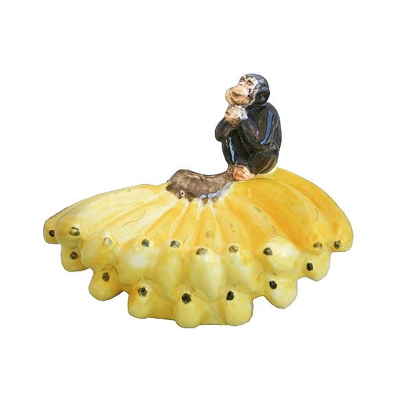 Cacho de bananas com macaco de faiança