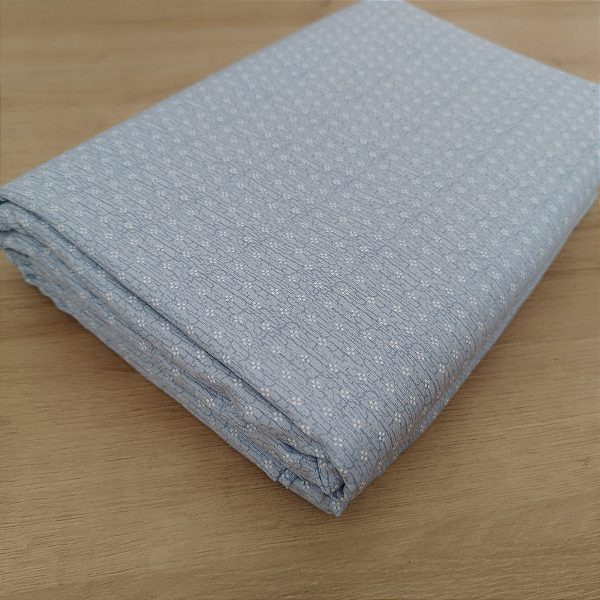 Tricoline bolinhas craqueladas fundo azul claro  50x150cm - Un