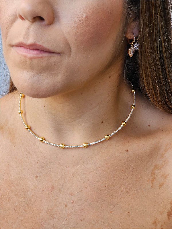 Aro riviera com esfera dourada