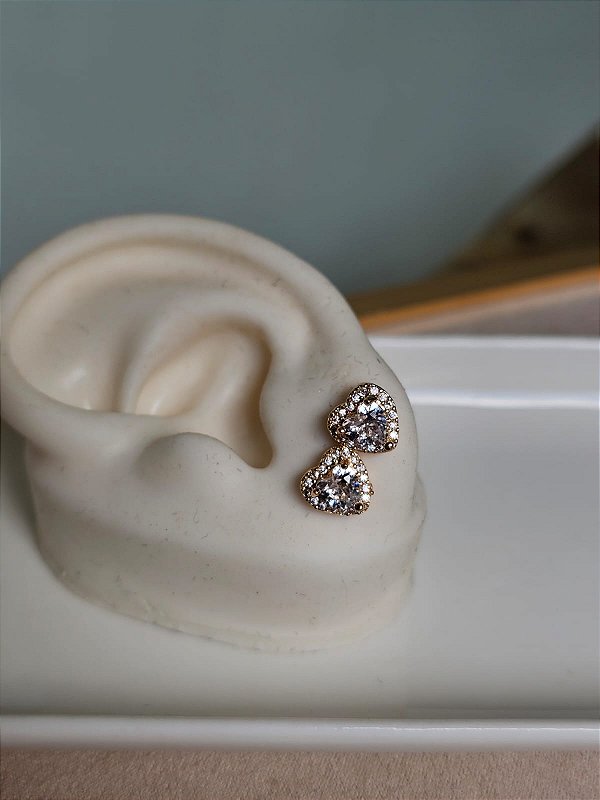 Brinco dois corações dourado