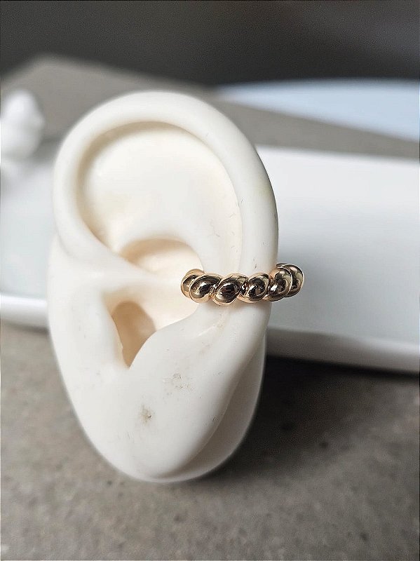 Piercing fake torcido dourado