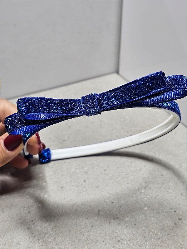 Tiara azul com brilho