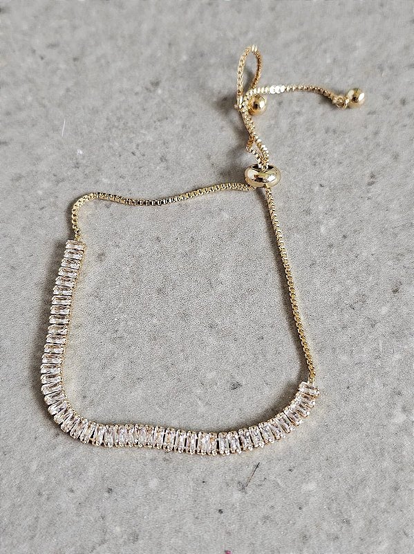 Pulseira riviera baguete gravatinha dourada