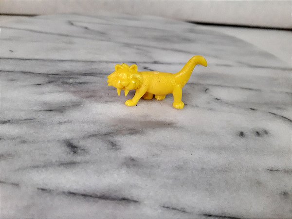 Anos 80, miniatura de vinil estática de tigre dente de sabre amarelo dos Flintstones coleção Danone Chambourcy