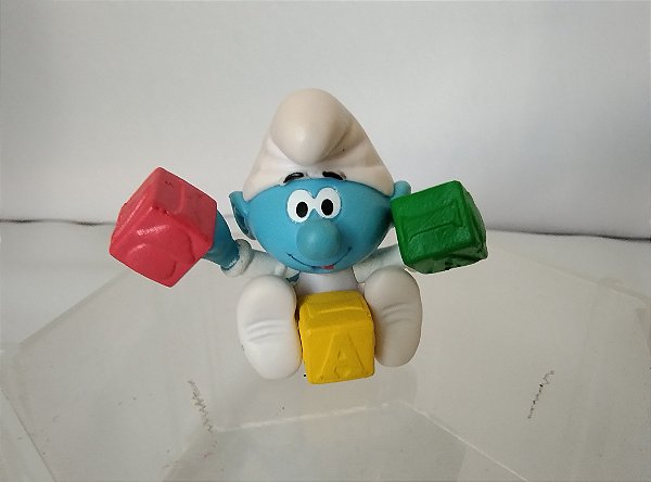 Smurf bebe com cubos coloridos Peyo 2008 Jakks, 4 cm