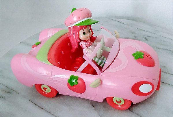 Carrinho de plástico ,buzina manual ,15 cm da moranguinho de 8 cm Hasbro 2008