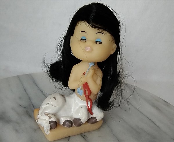 Boneca de borracha  peladinha de signo Sagitário sem marca , mas com características da Bap, 13 cm