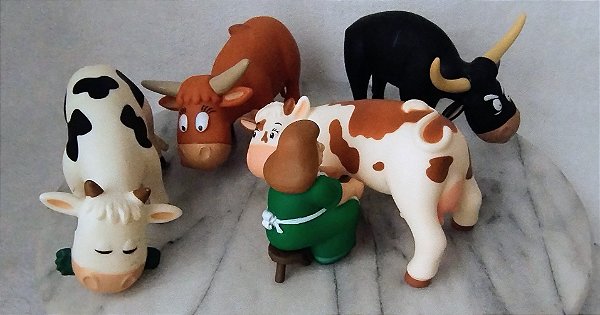Vacas e touros e mulher no banquinho ordenhando, coleção Animais da fazenda, Planeta de Agosti i 2014