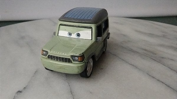 Miniatura Disney Cars Miles Axlerod Verde claro