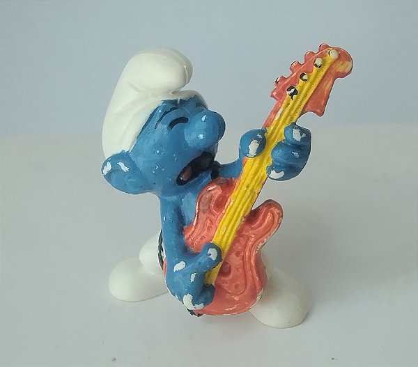 Miniatura de vinil Schleich de smurf roqueiiro 5cm guitarra vermelha Peyo 1978