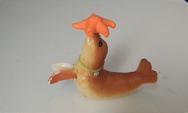 LPS vintage de 1993, leão marinho do Zoo , girando a estrela um dos braços mexe de mansinho, marca Kenner