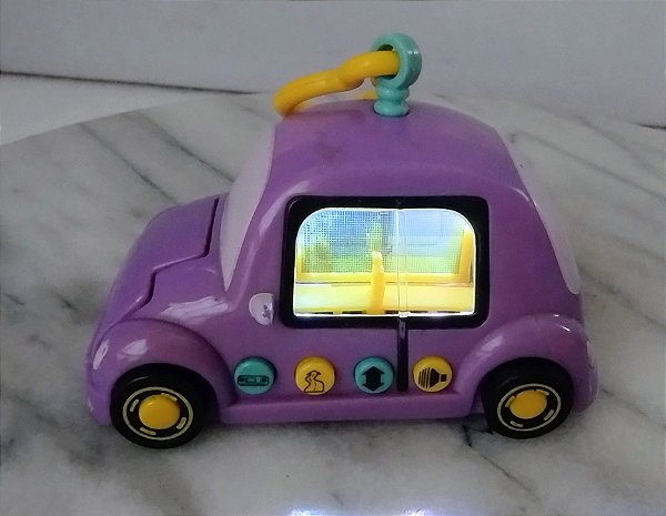 Carrinho de plástico Pixel Chix lilás com luz ,som , fala em português, 9 cm, Mattel 2005