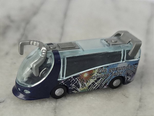 Miniatura ônibus de plástico Natal 1999 da colecao kinder ovo