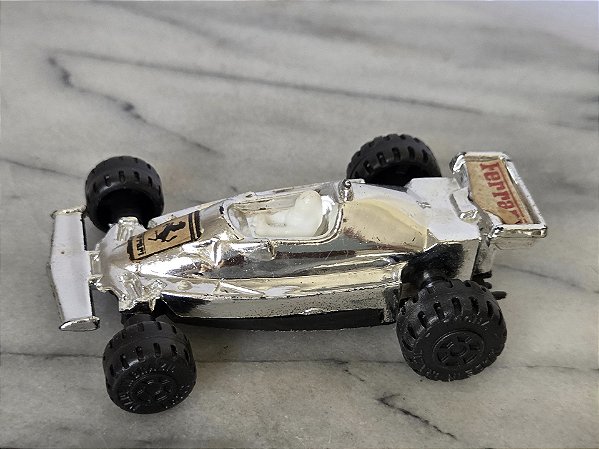 Carrinho Ferrari Formula 1 de plástico metalizado Rocha 9 cm anos 80