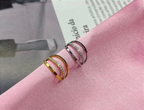 Argola segmentada conch aço tripla fileira