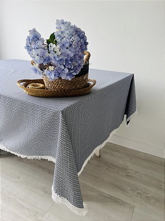 Toalha de mesa azul e branco
