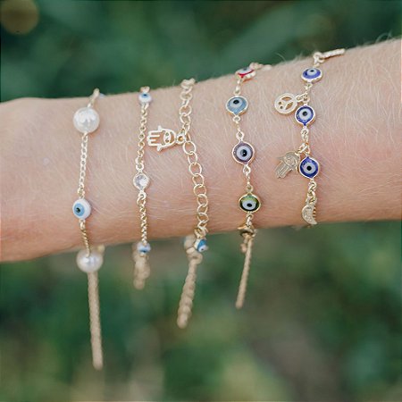 Pulseira olho grego com pérolas banhada a ouro 18k