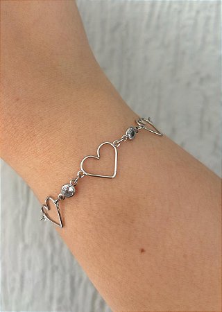 Pulseira de aço três corações vazados e zircônias
