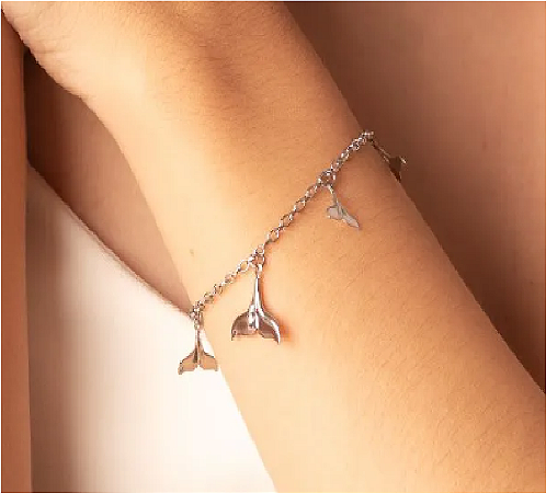 Pulseira de aço rabos de sereia