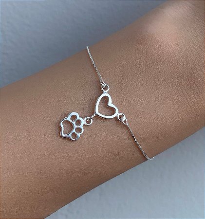 Pulseira de prata coração vazado e patinha
