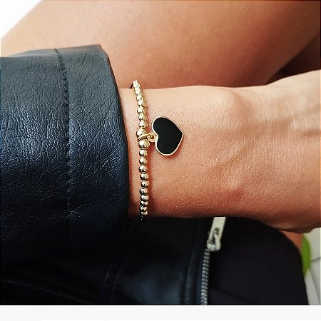 Pulseira Esferas Negras e Douradas com Pingente de Coração Banho em Ouro 18K