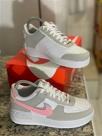 tenis da nike cinza com rosa