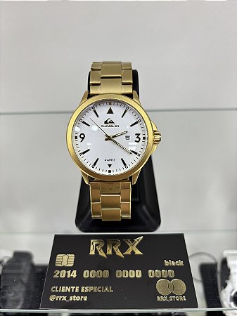 Relógio Quiksilver Dourado fundo Branco