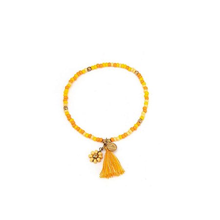 Pulseira flor de miçagas e tassel amarela