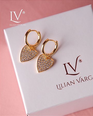 Brincos argola com pingente de coração cravejado