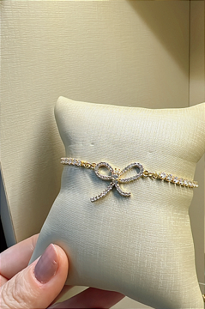 Pulseira riviera com laço cravejado
