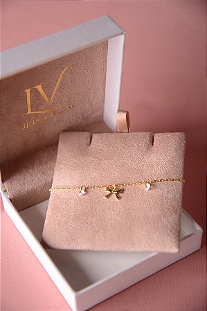 Pulseira infantil lacinho e pontos de luz