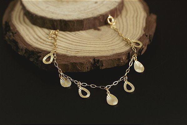 PULSEIRA FOLHEADA A OURO 18K GOTA VAZADA E TRABALHADA