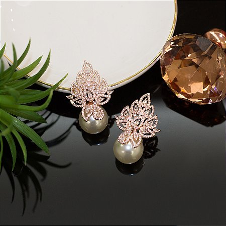 Brinco pérola e microzircônias